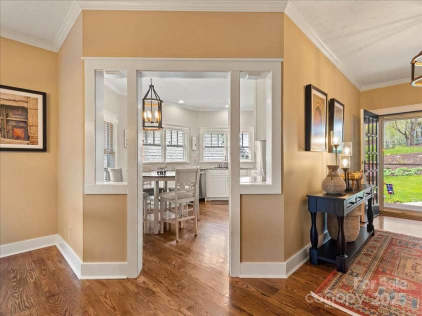 28 Lacoste Drive, Hendersonville, NC 28739.  MLS# CAR4246856, YatesRealty ID 15335. Lacoste Dining to Kitchen