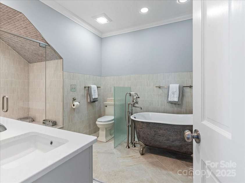 28 Lacoste Drive, Hendersonville, NC 28739.  MLS# CAR4246856, YatesRealty ID 15335. Owner Suite custom bath
