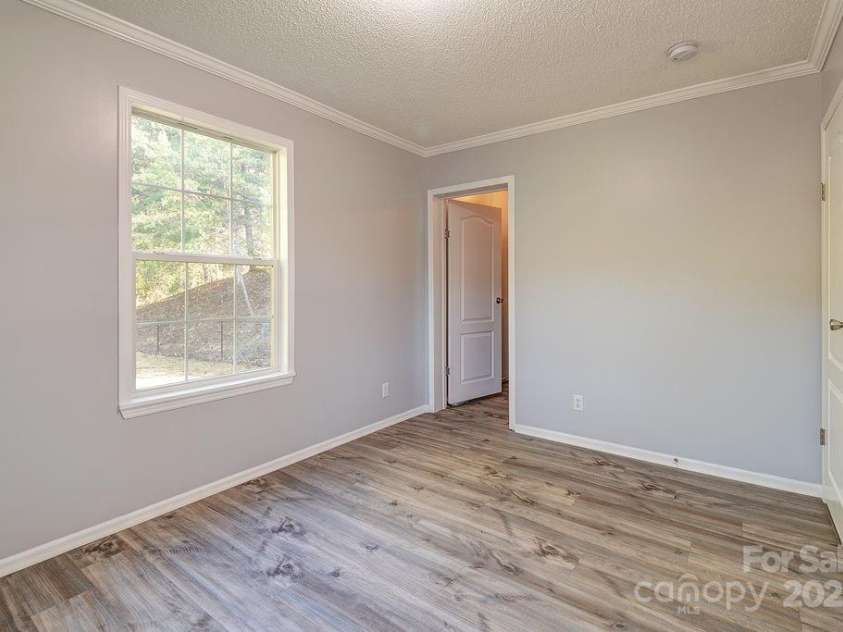 6 Clark Meadow Lane, Candler, NC 28715.  MLS# CAR4308426, YatesRealty ID 15336. 