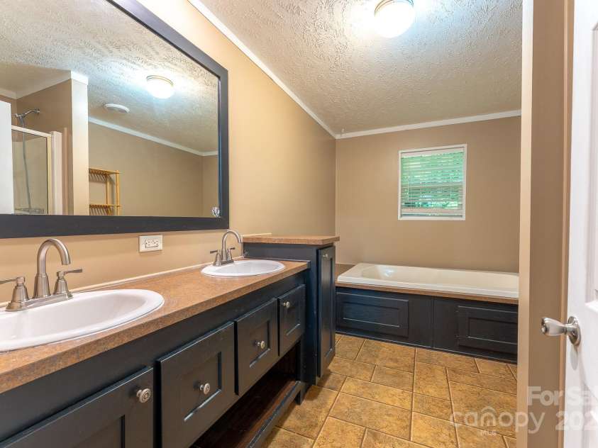 225 Opal Drive, Whittier, NC 28789.  MLS# CAR4259494, YatesRealty ID 15345. 