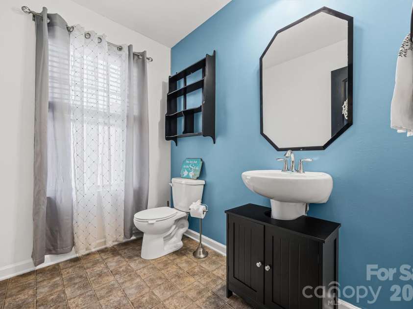 831 Yale Street, Rock Hill, SC 29730.  MLS# CAR4310648, YatesRealty ID 15346. Downstairs half bath