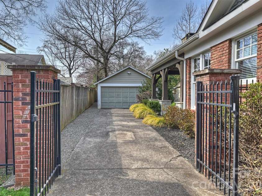 1912 Dilworth Road, Charlotte, NC 28203.  MLS# CAR4350720, YatesRealty ID 15352. Gated backyard