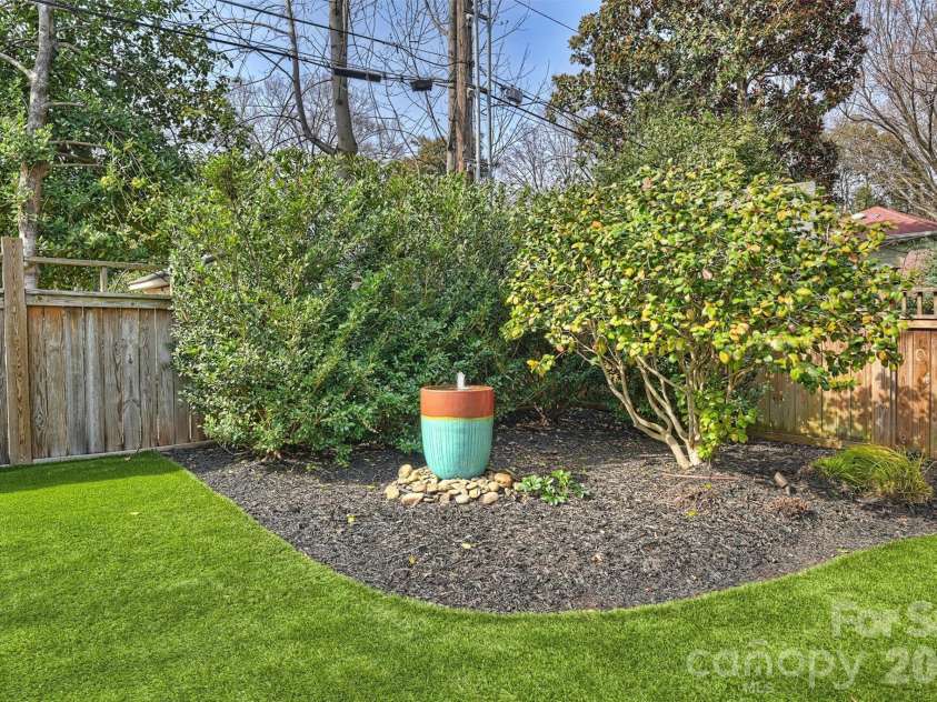 1912 Dilworth Road, Charlotte, NC 28203.  MLS# CAR4350720, YatesRealty ID 15352. Turf in backyard