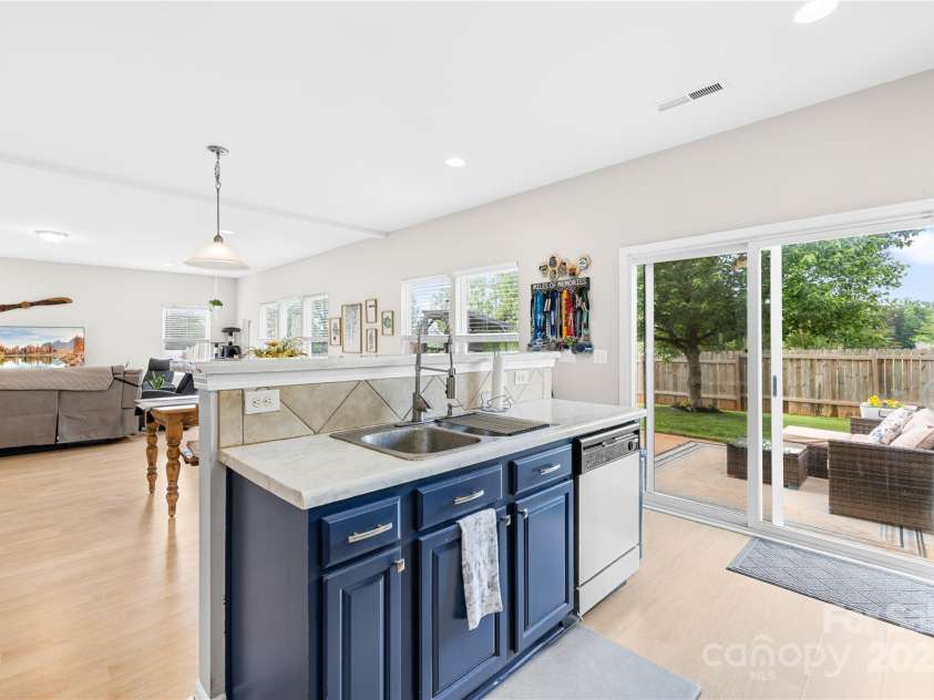 105 Altondale Drive, Statesville, NC 28625.  MLS# CAR4250668, YatesRealty ID 15356. Kitchen with views of the backyard