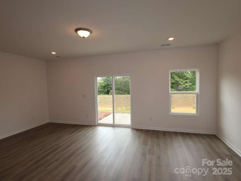1119 Overbrook Place, Wingate, NC 28174.  MLS# CAR4249318, YatesRealty ID 15362. Family room