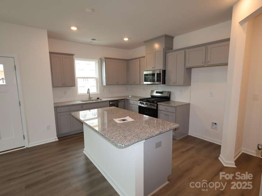 1119 Overbrook Place, Wingate, NC 28174.  MLS# CAR4249318, YatesRealty ID 15362. Kitchen