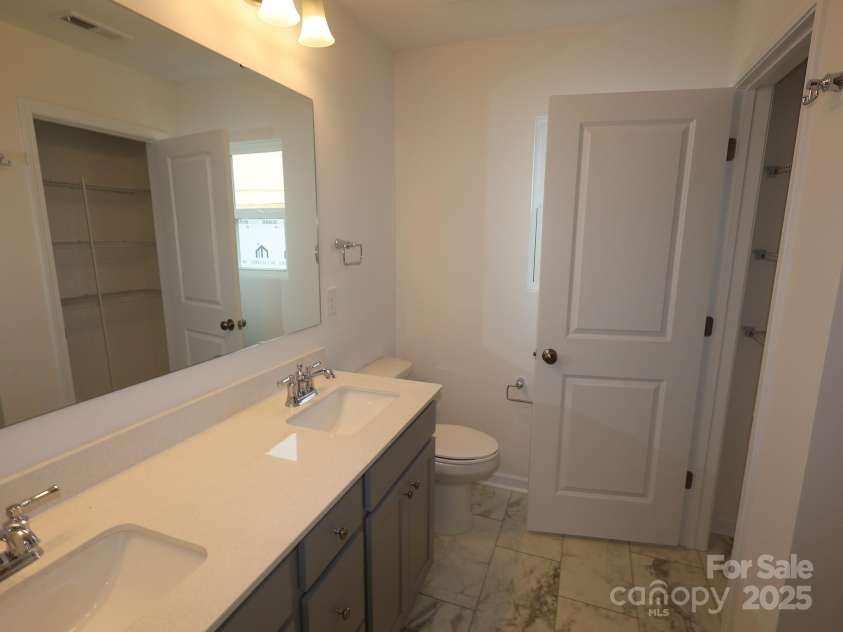 1119 Overbrook Place, Wingate, NC 28174.  MLS# CAR4249318, YatesRealty ID 15362. Owners bathroom