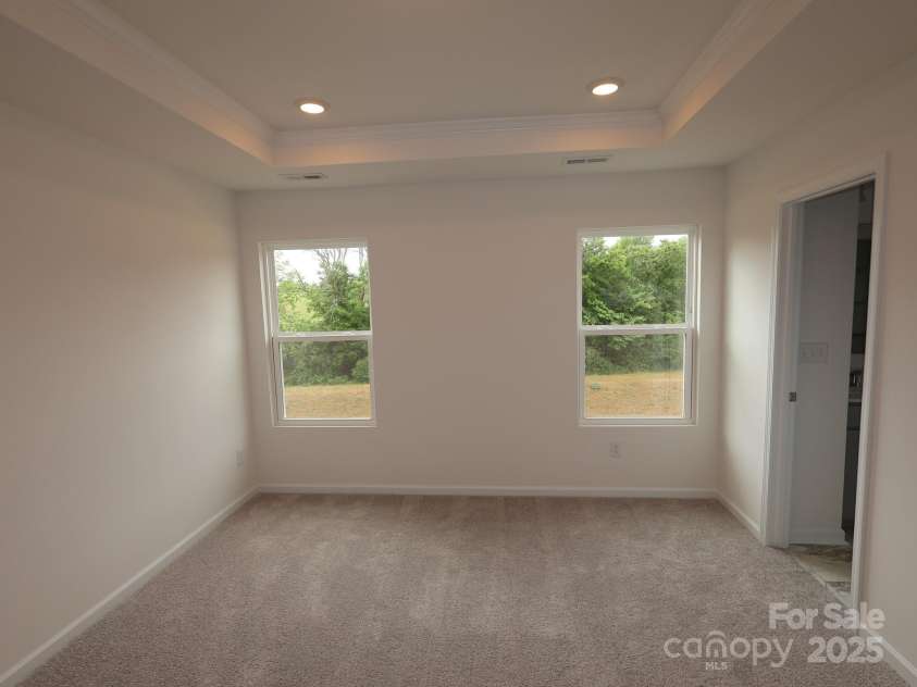 1119 Overbrook Place, Wingate, NC 28174.  MLS# CAR4249318, YatesRealty ID 15362. Owners bedroom