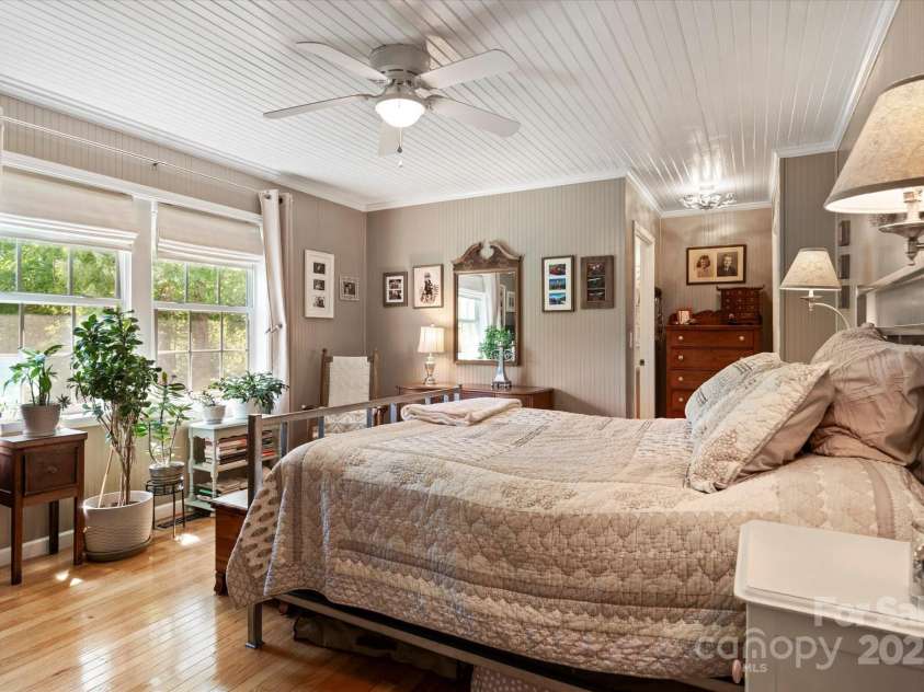1786 Fork Mountain Road, Bakersville, NC 28705.  MLS# CAR4264003, YatesRealty ID 15363. Primary bedroom with westerly facing windows.