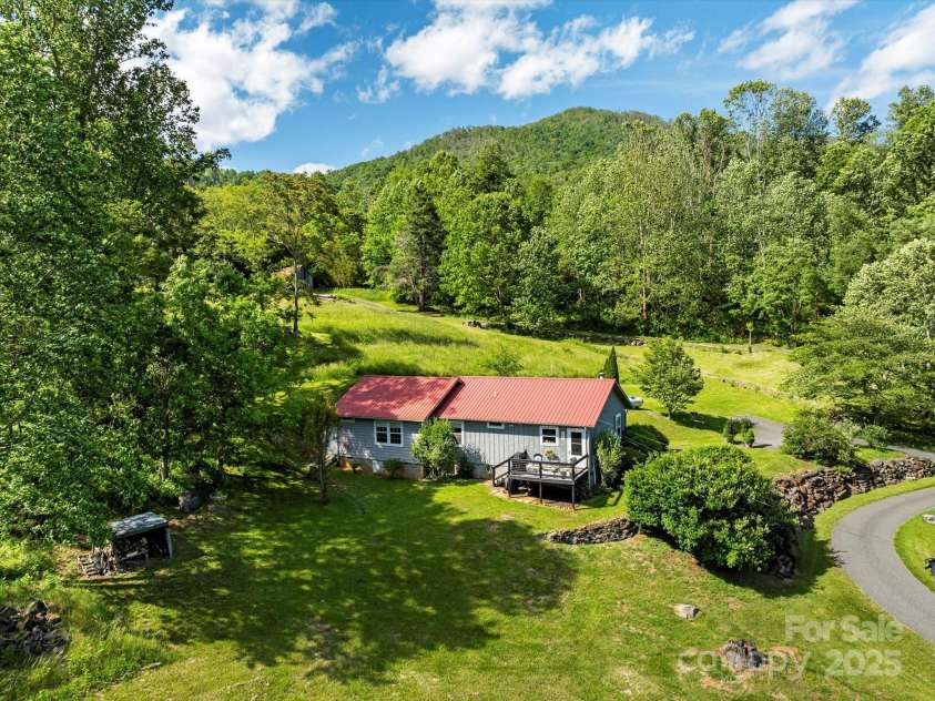 1786 Fork Mountain Road, Bakersville, NC 28705.  MLS# CAR4264003, YatesRealty ID 15363. Privately situated with paved access.