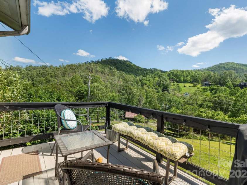 1786 Fork Mountain Road, Bakersville, NC 28705.  MLS# CAR4264003, YatesRealty ID 15363. Rear deck with mountain views.