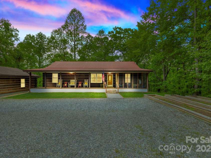 909 Pearson Falls Road, Saluda, NC 28773.  MLS# CAR4256456, YatesRealty ID 15364. 