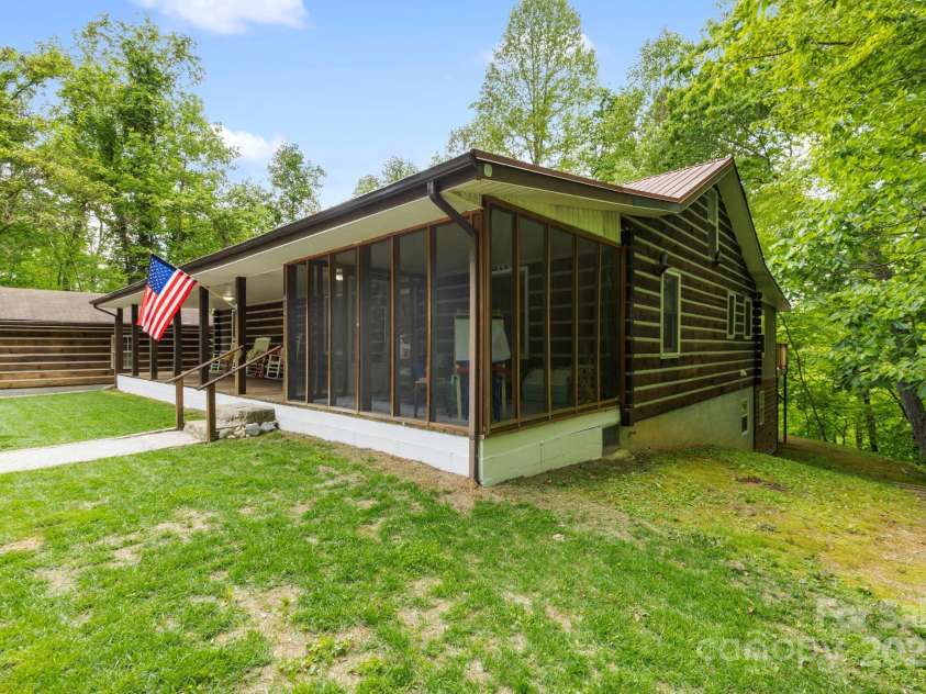 909 Pearson Falls Road, Saluda, NC 28773.  MLS# CAR4256456, YatesRealty ID 15364. 