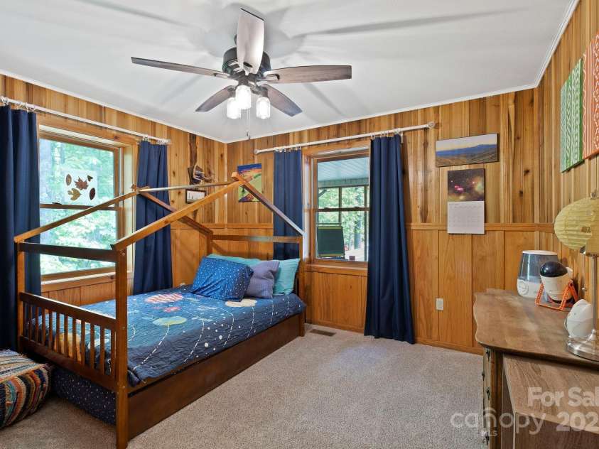 909 Pearson Falls Road, Saluda, NC 28773.  MLS# CAR4256456, YatesRealty ID 15364. 