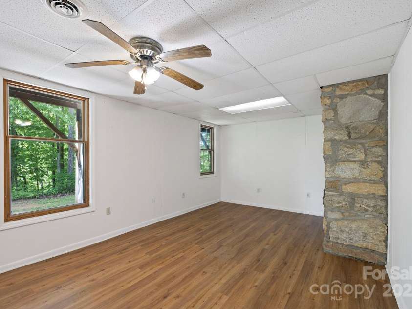 909 Pearson Falls Road, Saluda, NC 28773.  MLS# CAR4256456, YatesRealty ID 15364. 