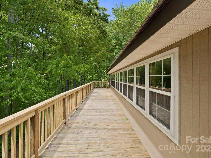 909 Pearson Falls Road, Saluda, NC 28773.  MLS# CAR4256456, YatesRealty ID 15364. 