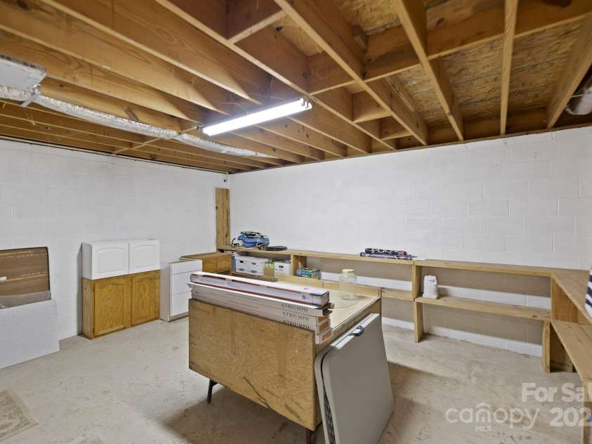 909 Pearson Falls Road, Saluda, NC 28773.  MLS# CAR4256456, YatesRealty ID 15364. 