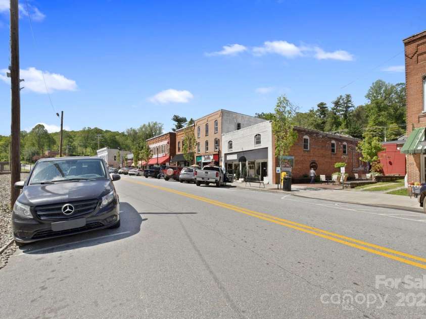 909 Pearson Falls Road, Saluda, NC 28773.  MLS# CAR4256456, YatesRealty ID 15364. 