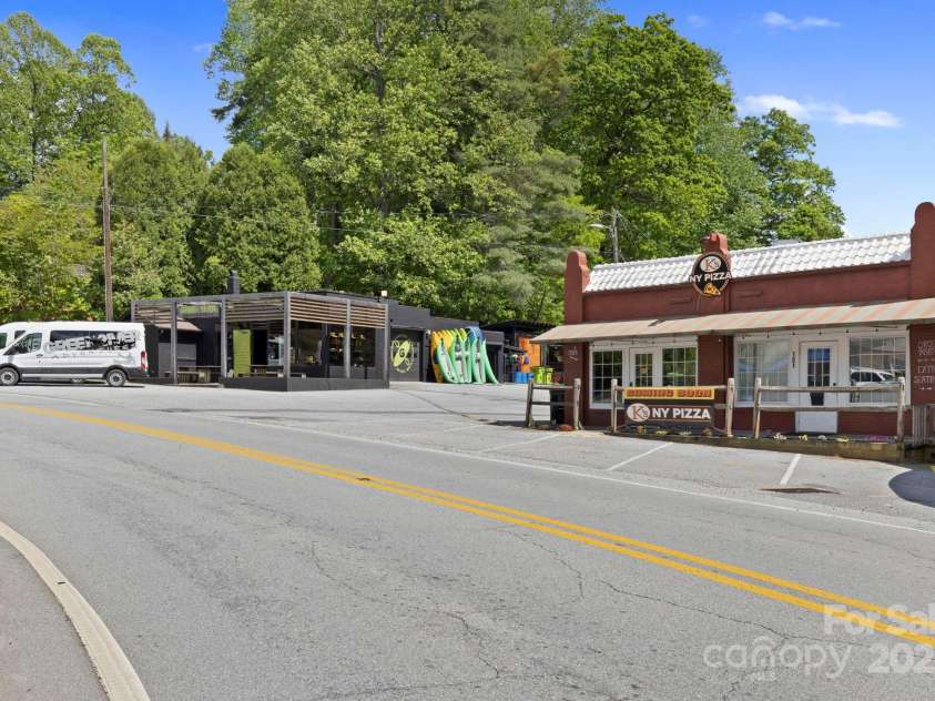 909 Pearson Falls Road, Saluda, NC 28773.  MLS# CAR4256456, YatesRealty ID 15364. 