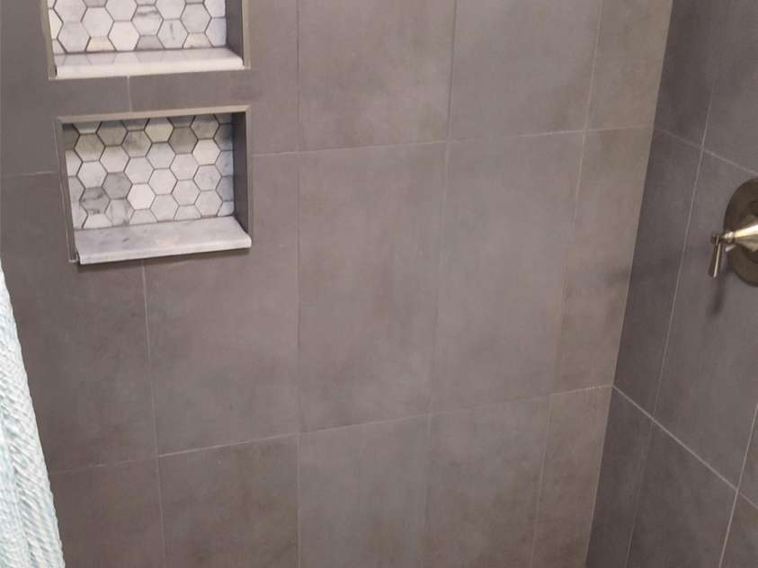 4755 US 23 Highway, Mars Hill, NC 28754.  MLS# CAR4285920, YatesRealty ID 1537. Downstairs tiled shower