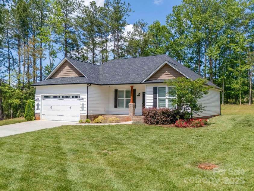142 Highland Drive, New London, NC 28127.  MLS# CAR4257851, YatesRealty ID 15374. 