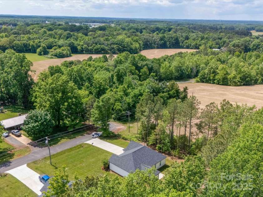 142 Highland Drive, New London, NC 28127.  MLS# CAR4257851, YatesRealty ID 15374. 