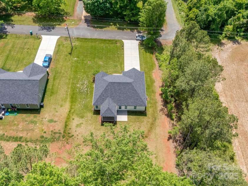 142 Highland Drive, New London, NC 28127.  MLS# CAR4257851, YatesRealty ID 15374. 