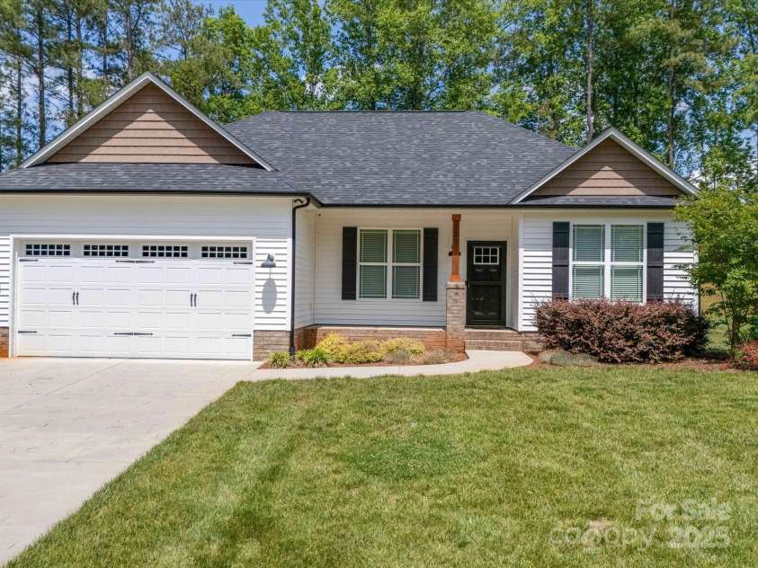 142 Highland Drive, New London, NC 28127.  MLS# CAR4257851, YatesRealty ID 15374. 