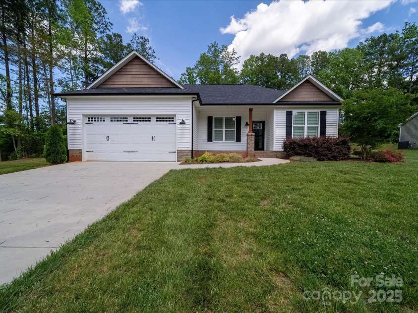 142 Highland Drive, New London, NC 28127.  MLS# CAR4257851, YatesRealty ID 15374. 