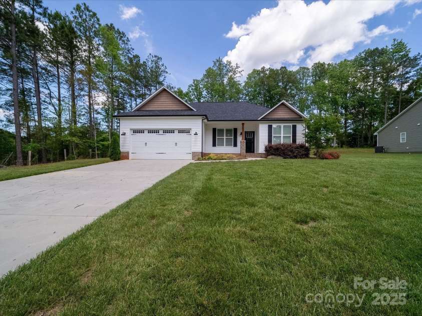 142 Highland Drive, New London, NC 28127.  MLS# CAR4257851, YatesRealty ID 15374. 