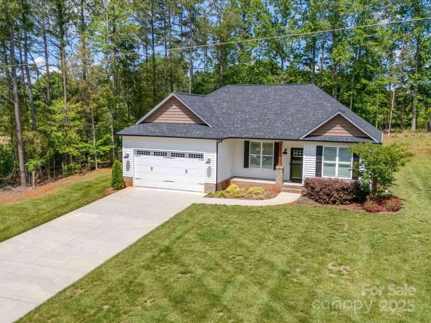 142 Highland Drive, New London, NC 28127.  MLS# CAR4257851, YatesRealty ID 15374. 