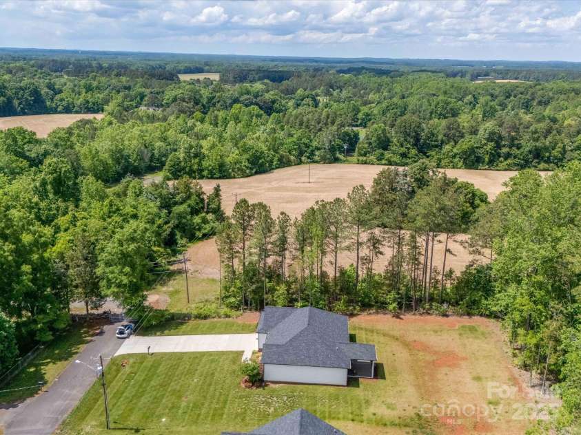 142 Highland Drive, New London, NC 28127.  MLS# CAR4257851, YatesRealty ID 15374. 