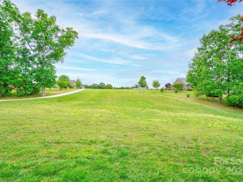 649 Harrill Dairy Road, Forest City, NC 28043.  MLS# CAR4312400, YatesRealty ID 15375. SIDE YARD