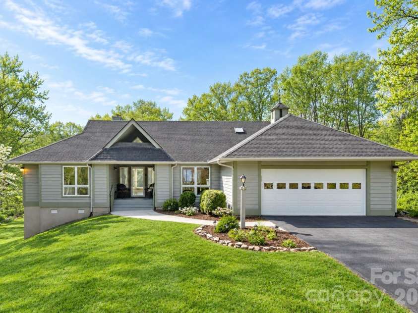 132 Broadmoor Drive, Flat Rock, NC 28731.  MLS# CAR4350035, YatesRealty ID 15377. Enhanced Spring via Chatgpt