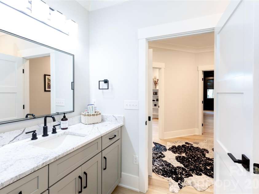 124 Direct Drive, Mooresville, NC 28117.  MLS# CAR4359656, YatesRealty ID 15382. Suite bathroom
