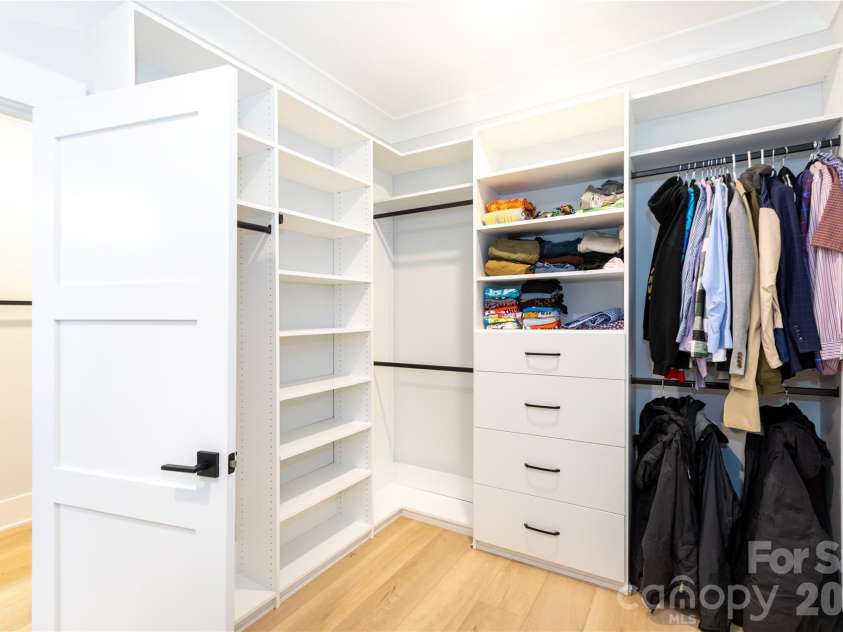 124 Direct Drive, Mooresville, NC 28117.  MLS# CAR4359656, YatesRealty ID 15382. Suite custom closet