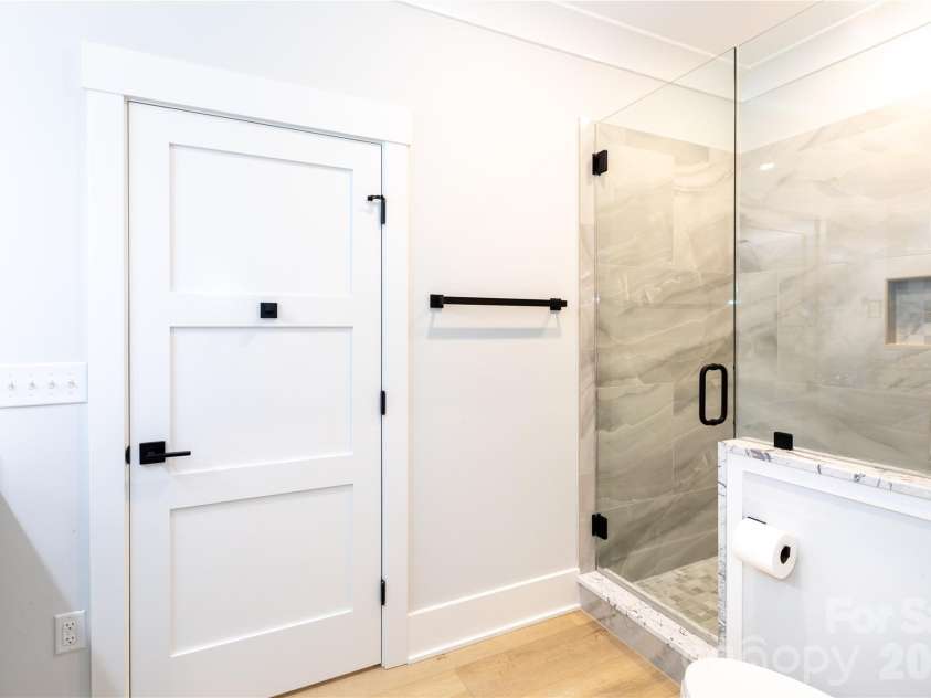 124 Direct Drive, Mooresville, NC 28117.  MLS# CAR4359656, YatesRealty ID 15382. Suite walk-in shower