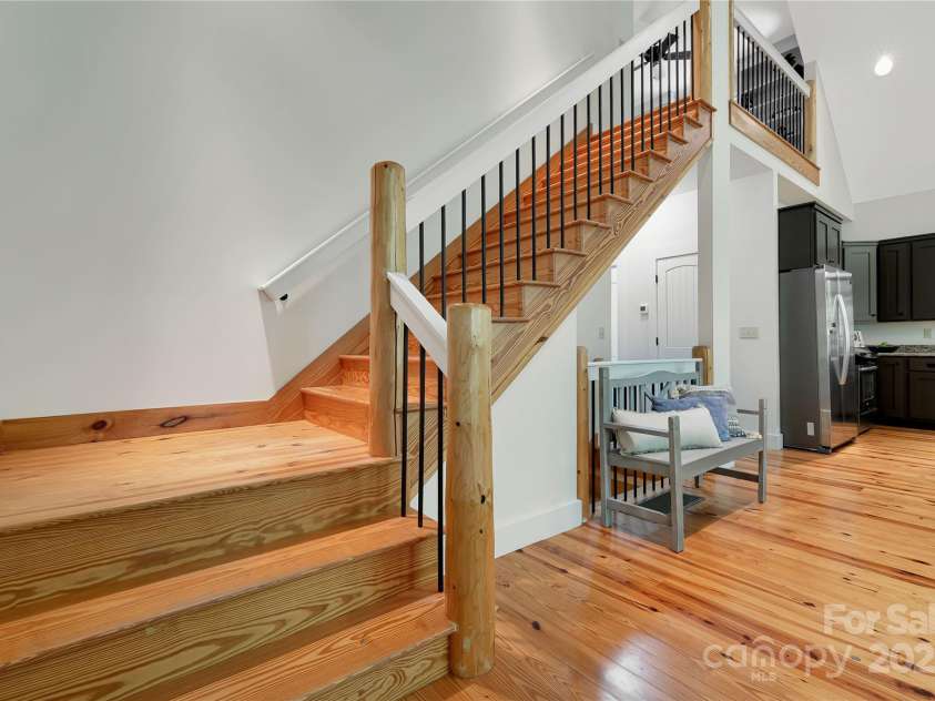 224 Corsica Lane, Saluda, NC 28773.  MLS# CAR4294125, YatesRealty ID 15383. Another half story awaits you up the stairs