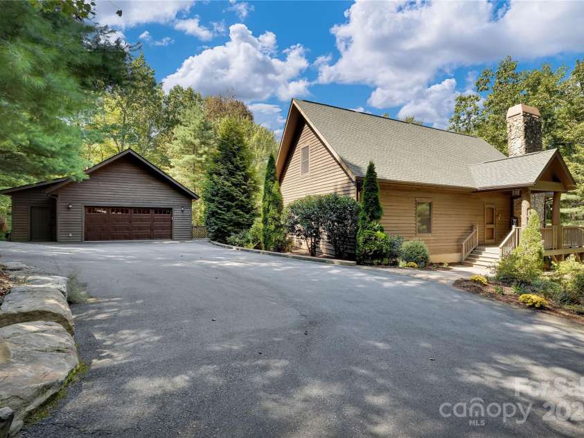 224 Corsica Lane, Saluda, NC 28773.  MLS# CAR4294125, YatesRealty ID 15383. Circular driveway for ease of parking and turning around