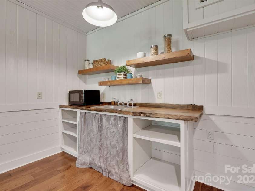 224 Corsica Lane, Saluda, NC 28773.  MLS# CAR4294125, YatesRealty ID 15383. Convert to kitchenette for a full downstairs apartment