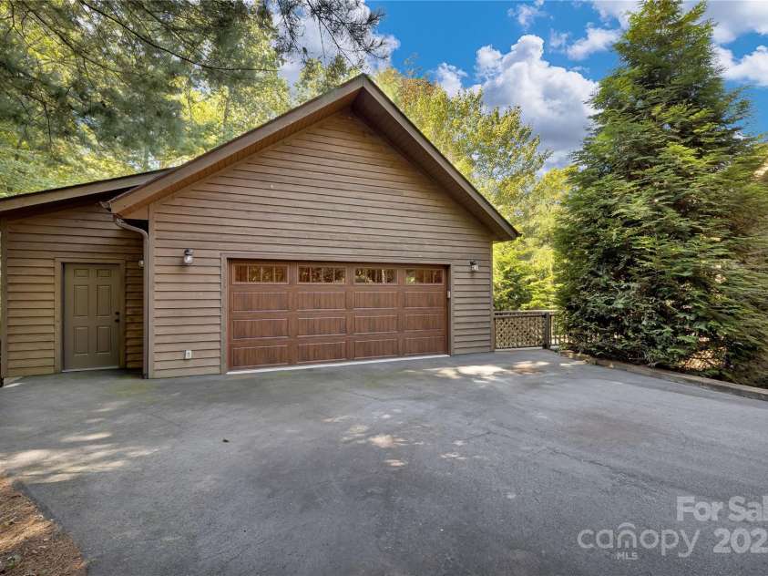 224 Corsica Lane, Saluda, NC 28773.  MLS# CAR4294125, YatesRealty ID 15383. Detached oversized garage
