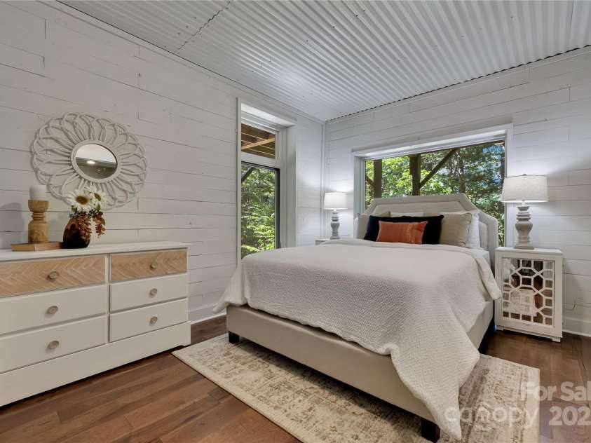 224 Corsica Lane, Saluda, NC 28773.  MLS# CAR4294125, YatesRealty ID 15383. Downstairs bedroom