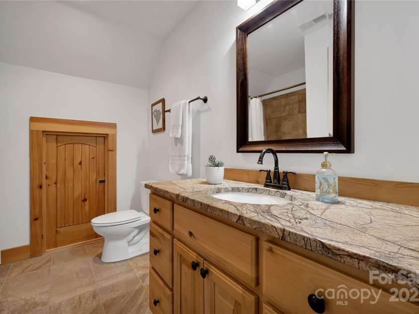 224 Corsica Lane, Saluda, NC 28773.  MLS# CAR4294125, YatesRealty ID 15383. Full bathroom upstairs