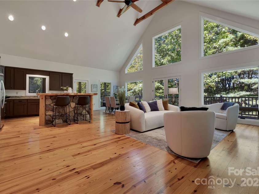 224 Corsica Lane, Saluda, NC 28773.  MLS# CAR4294125, YatesRealty ID 15383. Light filled beautiful open concept living area