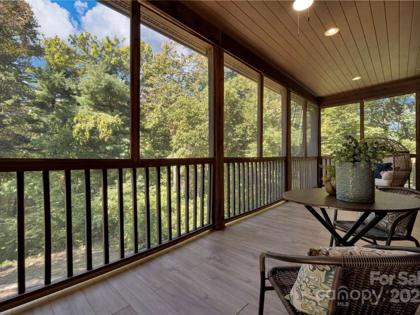 224 Corsica Lane, Saluda, NC 28773.  MLS# CAR4294125, YatesRealty ID 15383. Screened porch off the kitchen