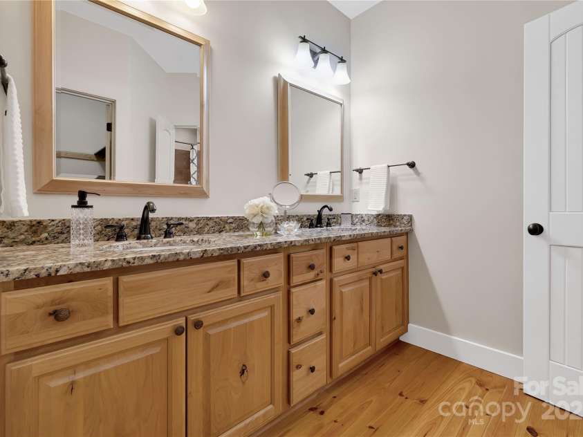 224 Corsica Lane, Saluda, NC 28773.  MLS# CAR4294125, YatesRealty ID 15383. Spacious primary bathroom