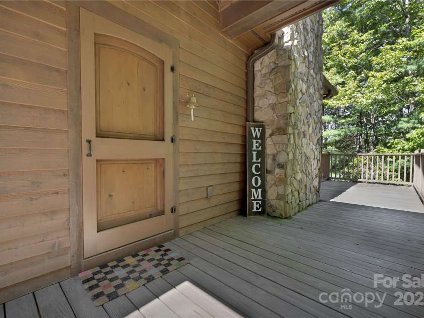 224 Corsica Lane, Saluda, NC 28773.  MLS# CAR4294125, YatesRealty ID 15383. Welcoming covered entrance