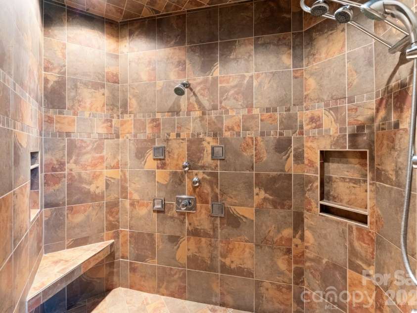 4068 Flagstone Drive, Lancaster, SC 29720.  MLS# CAR4347552, YatesRealty ID 15387. Double showers with multiple features