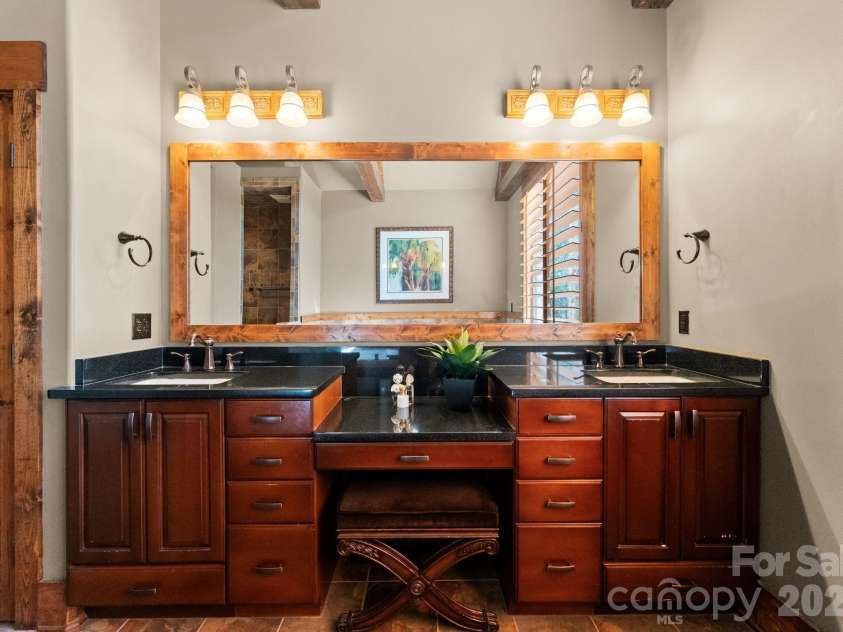 4068 Flagstone Drive, Lancaster, SC 29720.  MLS# CAR4347552, YatesRealty ID 15387. Elegant double vanity with make up area
