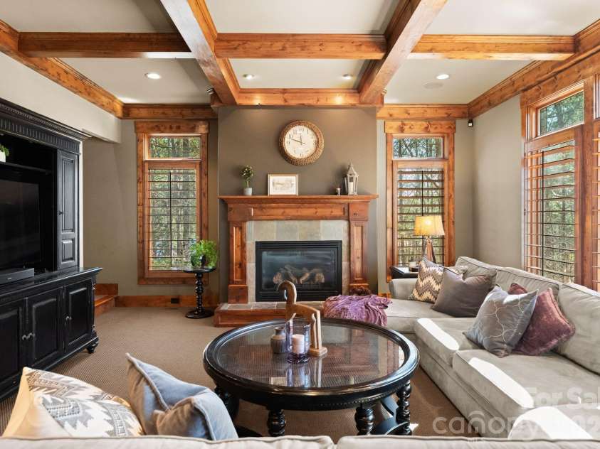 4068 Flagstone Drive, Lancaster, SC 29720.  MLS# CAR4347552, YatesRealty ID 15387. Great room extending from kitchen with gas fireplace and coffered ceiling